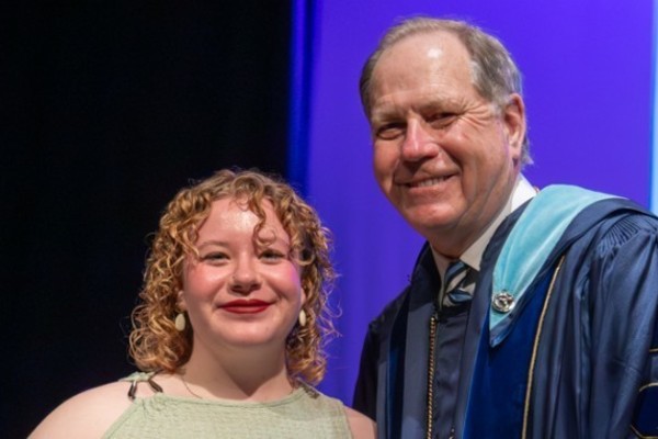 Representation of the achievement named 'Cora-Mae Bolster Honored by Hartwick College'.