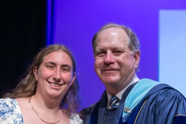 Representation of the achievement named 'Molly Corbett Honored by Hartwick College'.