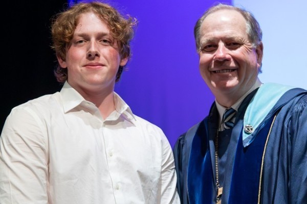 Representation of the achievement named 'Cooper Cohen Recognized for Outstanding Academic Achievement at Hartwick College'.