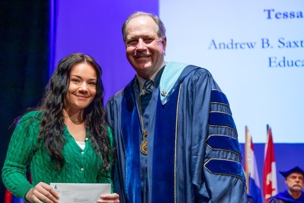 Representation of the achievement named 'Tessa Cox Honored by Hartwick College'.