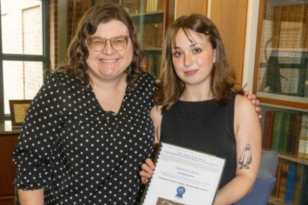 Representation of the achievement named 'Madeleine Orwick '26 wins 2026 Library Research Award'.
