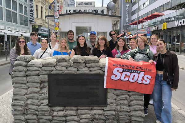 CHECKPOINT CHARLIE: The Monmouth group is pictured at the site that was the crossing point between West Berlin and East Berlin. 