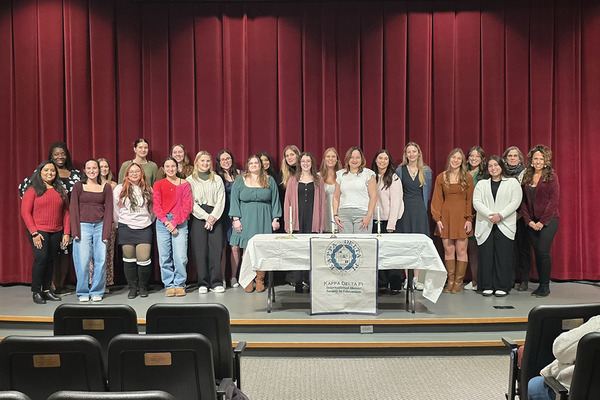 Representation of the achievement named 'Students inducted into KDP education honor society'.