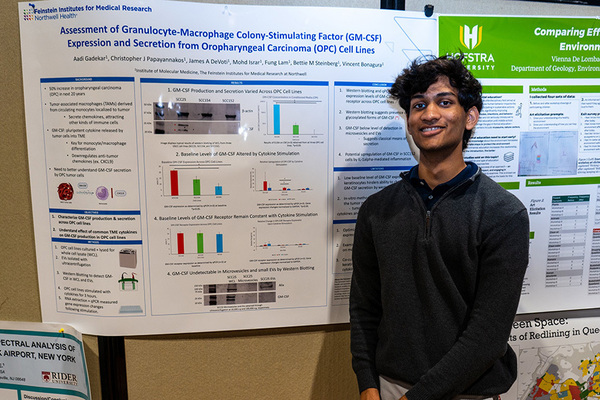 Aadi Gadekar with his research.