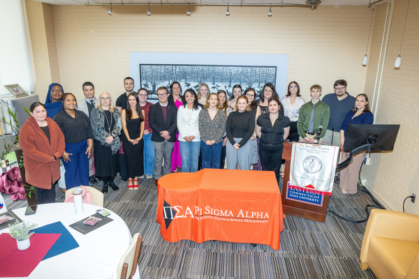 Representation of the achievement named '23 students inducted into Pi Sigma Alpha honor society'.