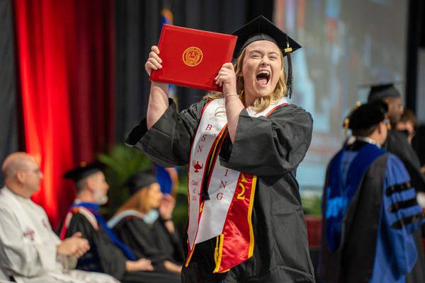 One Carthage College graduate celebrates earning her diploma.