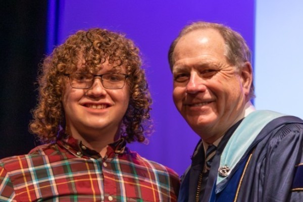 Representation of the achievement named 'Aidan Dugan Honored by Hartwick College'.
