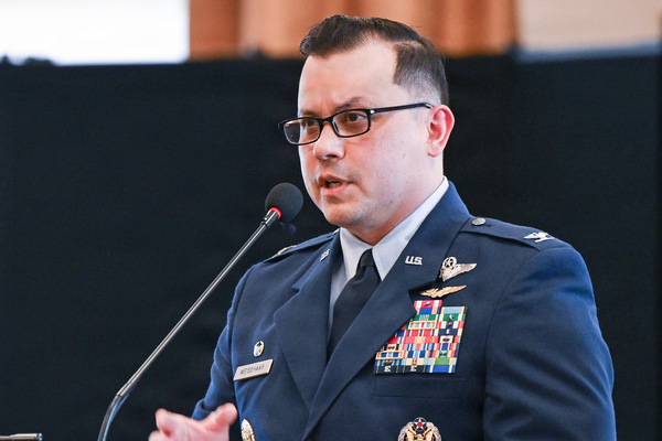 Colonel Christopher Weisshaar speaks during his assumption of command ceremony at the 107th Attack Wing, on June 6 2026 at Niagara Falls Air Reserve Station. Colonel Christopher Weisshaar assumes command of the 107th Attack Wing, June 6 2026 at Niagara Falls Air Reserve Station. During his time in naval aviation, Weisshaar deployed in support of operations in Iraq, Afghanistan, and the Horn of Africa. Over the course of his career, he has served in a variety of operational roles, including instructor, evaluator, and mission commander. New York Air National Guard photo by Capt Jason Carr      