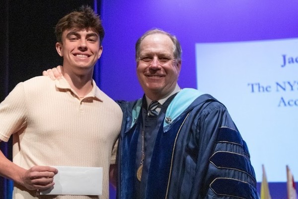 Representation of the achievement named 'Jackson Frame Honored by Hartwick College '.