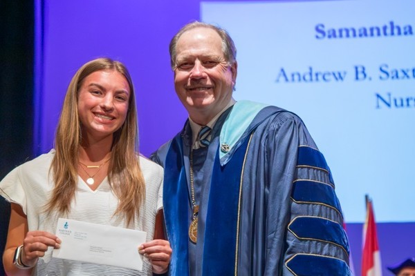 Representation of the achievement named 'Samantha Garback Honored by Hartwick College'.