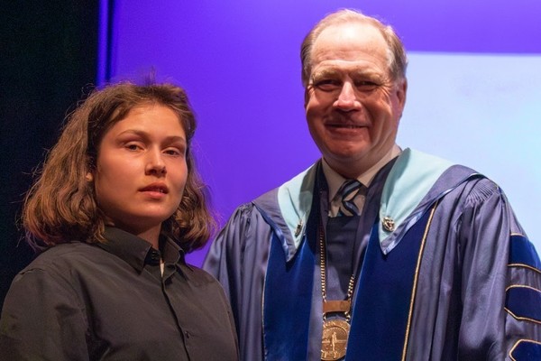 Representation of the achievement named 'Brynita Haas Honored by Hartwick College '.