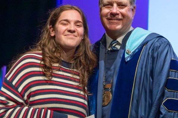 Representation of the achievement named 'Sophia Hawkins Honored by Hartwick College'.