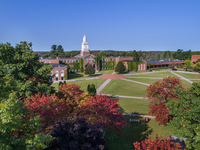 An aerial photo shows the SUNY Potsdam Academic Quad in the fall.