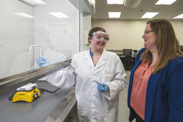 Image of two researchers in a lab.