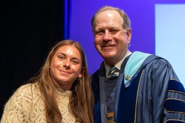 Representation of the achievement named 'Natalie O'Malley Honored by Hartwick College'.