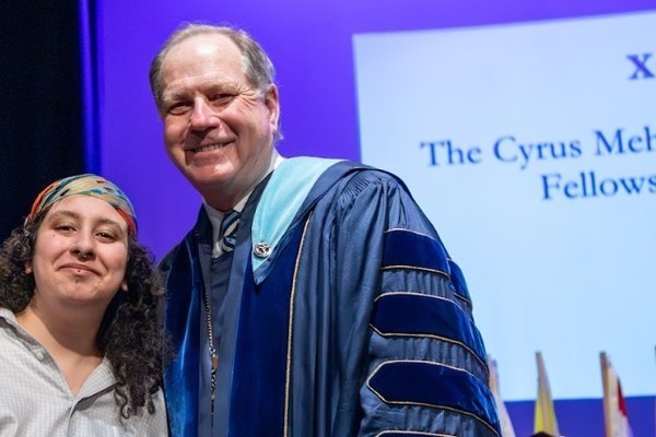 Representation of the achievement named 'Xan Patat Honored by Hartwick College'.