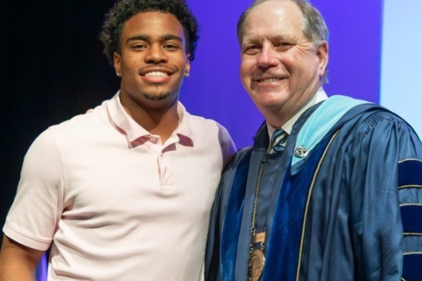 Representation of the achievement named 'Malachi Polson Honored by Hartwick College'.