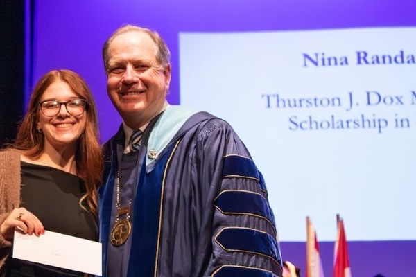 Representation of the achievement named 'Nina Randazzo Honored by Hartwick College'.