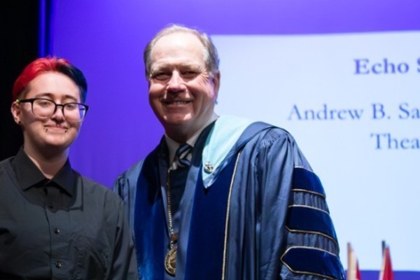 Representation of the achievement named 'Echo Schabert Honored by Hartwick College'.
