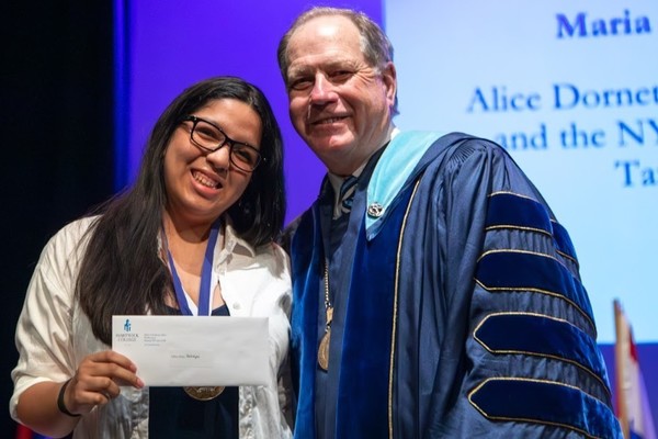 Representation of the achievement named 'Maria Serra Restrepo Honored by Hartwick College '.