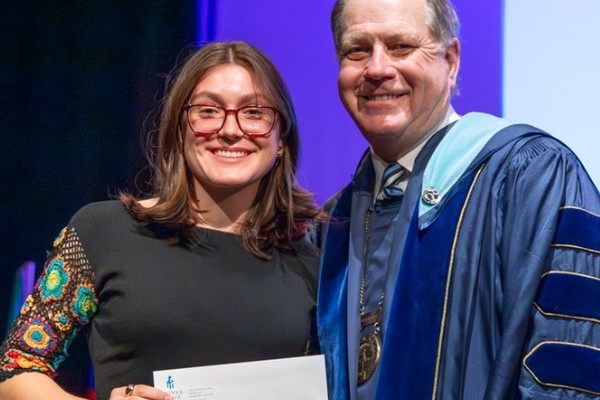 Representation of the achievement named 'Anne Stanavich Honored by Hartwick College '.