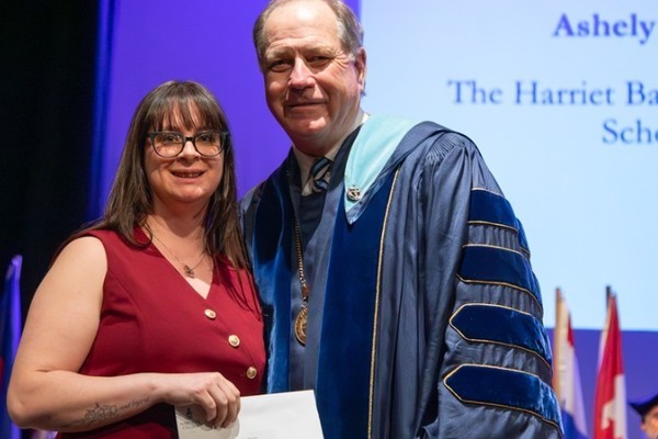 Representation of the achievement named 'Ashely Wheelock Honored by Hartwick College '.