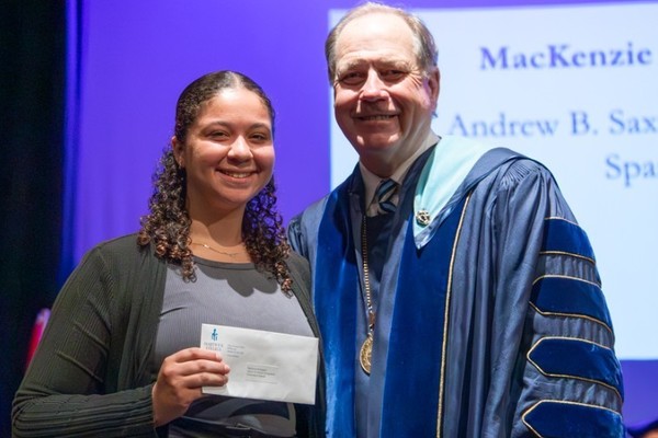 Representation of the achievement named 'MacKenzie Wellington Honored by Hartwick College'.