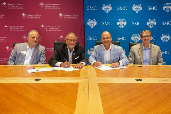 Sherman College of Chiropractic and Spartanburg Methodist College (SMC) have signed an articulation agreement establishing a streamlined pathway for students pursuing careers in chiropractic. The agreement guarantees admission to Sherman College's Doctor of Chiropractic program for qualified SMC graduates who complete the designated pre-chiropractic curriculum and meet established admission requirements. Signing participants included (from left): Sherman College’s Dr. Joe Donofrio, provost and chief academic officer, and Dr. Jack Bourla, president; and from SMC, Scott Cochran, president, and Dr. Curt Laird, provost and executive vice president of academic affairs.