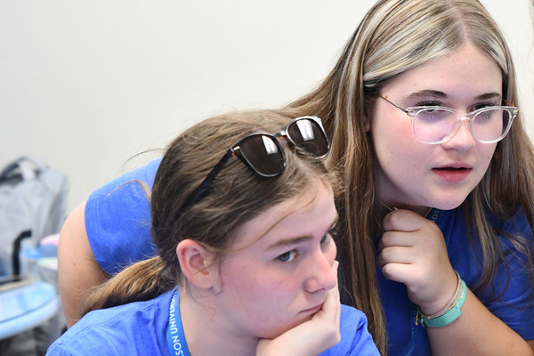 Rogers Scholars Lizzie Boone of Greensburg, left, and Reagan Day of Middlesboro, collaborate on a presentation about the program’s education major on Thursday, June 18, in the Lindsey Wilson University Cralle Student Union Building. Boone, who attends Campbellsville High School, and Day, who attends Bell County High School, were among 50 rising high school juniors from 31 Kentucky counties in Eastern and Southern Kentucky who spent June 14-18 at Lindsey Wilson as part of the Center for Rural Development’s Rogers Scholars Program.