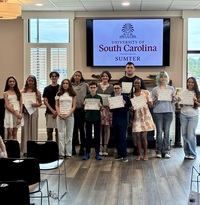 USC Sumter Spring Poetry Contest finalists holding their certificates.