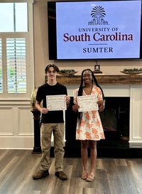High School winners of the USC Sumter Spring Poetry Contest, Elmer Atkinson and Skylah Segre.