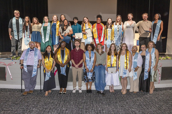 Representation of the achievement named 'Social work program inducts 9 students into Phi Alpha'.