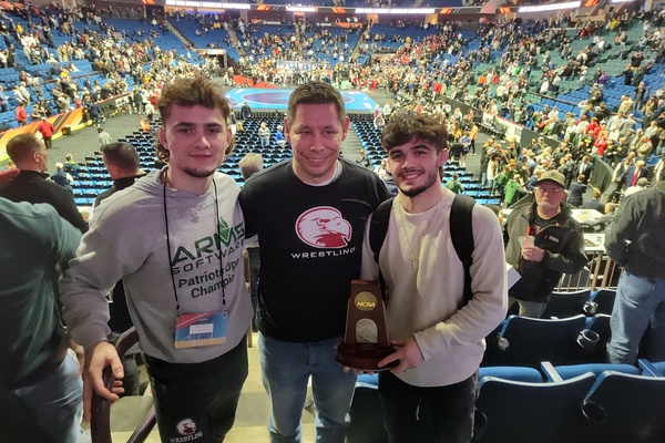 Dan Heckert (center) with Gable Strickland ’25 (left) and Anthony ’24 Noto (right) at the 2023 NCAA DI Wrestling National Championships in Tulsa.