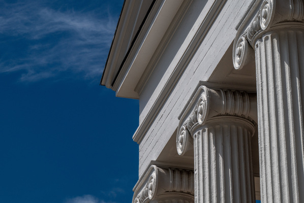 Image of the Lyceum against a deep blue sky.
