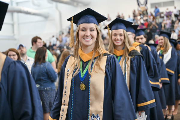Students walk into SUNY Canton's 118th Commencement Ceremony.