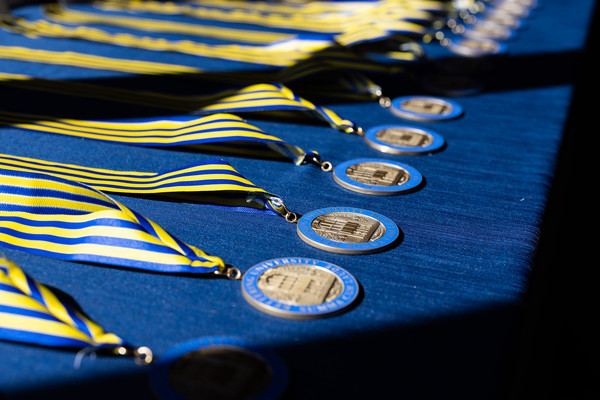 Summa cum laude medals.