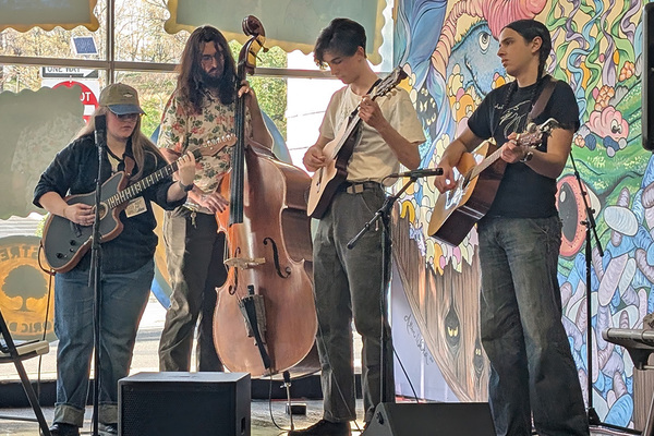 Representation of the achievement named 'UNG students present, perform at String Band Summit'.