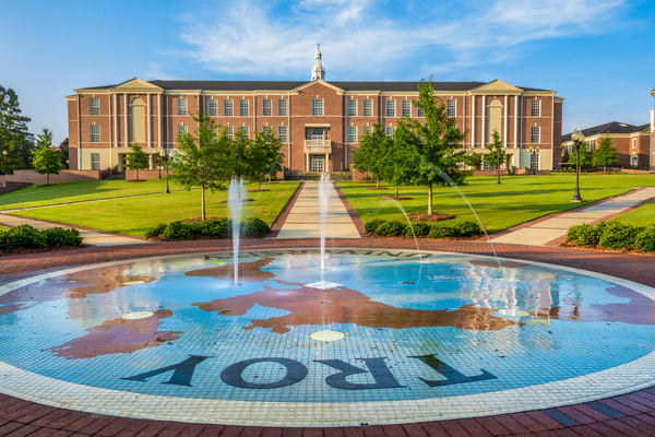 The fountain on the back quad with John Robert Lewis Hall in the background