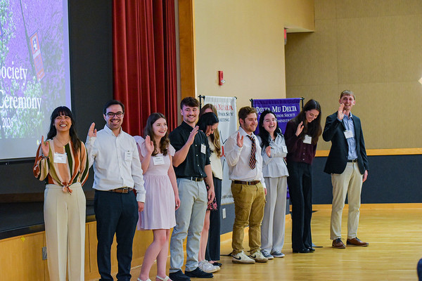 Representation of the achievement named 'College of Business inducts 49 students into 3 honor societies'.
