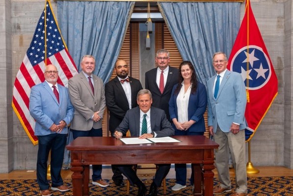 Gov. Bill Lee signs legislation updating Tennessee’s Athletic Training Practice Act on June 4. Pictured (left to right) are Sen. Haile, Rep. Tim Hicks, Tennessee Athletic Trainers’ Society Vice President Thaddeus Avery, Gov. Bill Lee, Johnnie Anderson, Dr. Racheal Lawler, and Sen. Tom Hatcher.