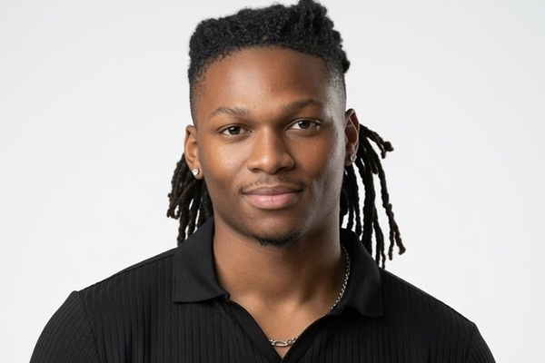 Headshot of student wearing black shirt