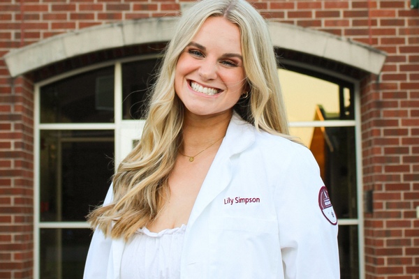 Representation of the achievement named 'FHU Graduate Earns National Alpha Chi Scholarship Ahead of Medical School'.