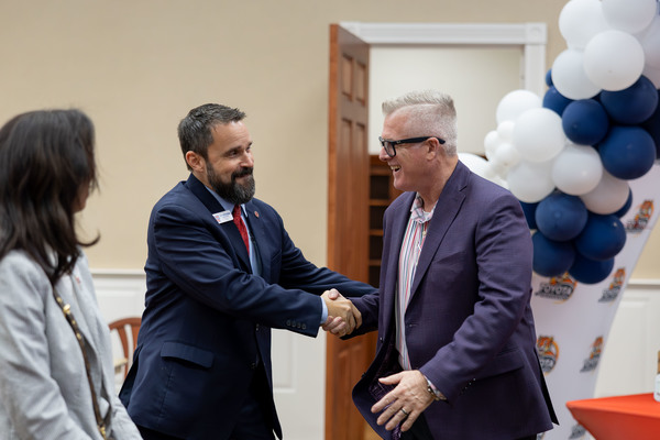 Northwest President Dr. Michael J. Heindl shakes hands with Toyota of Hernando's General Manager Garrett McDonald. Photo by Sarah Smith-Hutchinson