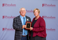 Tim Dempsey and Suzanne Smith pose with the Honorary Lifetime Membership Award.
