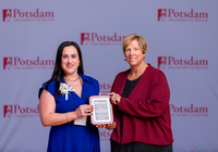Christina Palazzo-Catalano and Suzanne Smith pose with the Hosmer Excellence in Music Teaching Award.