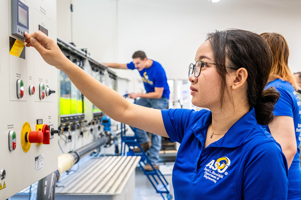 ASU engineering students working with the hydraulic water flume in the Hunter Strain Engineering Labs