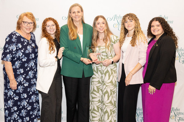 From left, are Amy Brooks, chapter advisor; Bree Johnson, Zeta alumna ’26; Jamie Jones Miller, national president; Paige Smith, chapter president; Mia Morsa, vice president of member development; Emily Smeal, national collegiate vice president. 