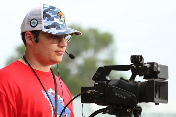 Bryce Parker films events at Mandan Rodeo Days in North Dakota as part of his EIU internship experience.