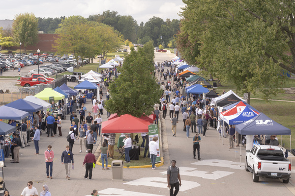 Trine University students meet and network with employers lining Thunder Drive during last year's Tailgate for Talent. This year's event will be on Sept. 24. (File photo by Dean Orewiler / Trine University)