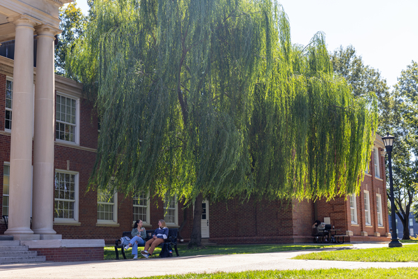 Students sit near Austin Peay State University's Clement building.